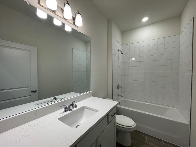 Furnished interior view inside a new home in Angeline, Land O' Lakes (Image 9).