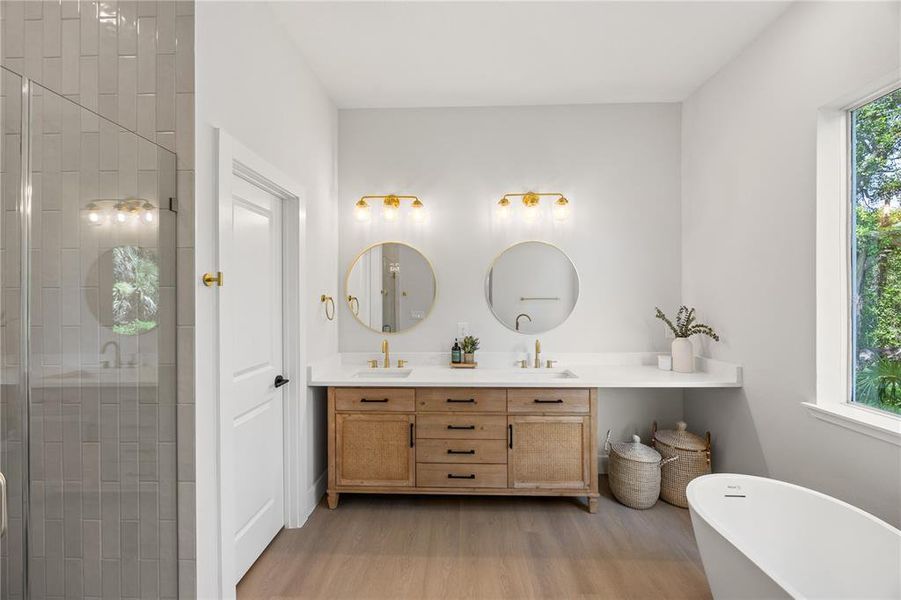 Primary Bath with double sinks, WC room, Stand alone tub and huge walk in shower Primary Bath with double sinks, WC room, Stand alone tub and huge walk in shower