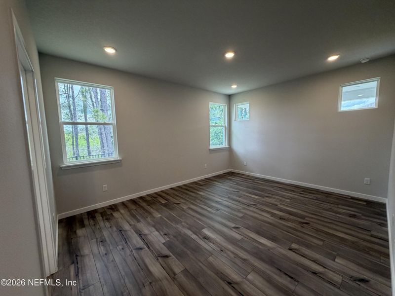 Spacious, unfurnished interior of a new home in Reserve East, Flagler Beach (Image 54).