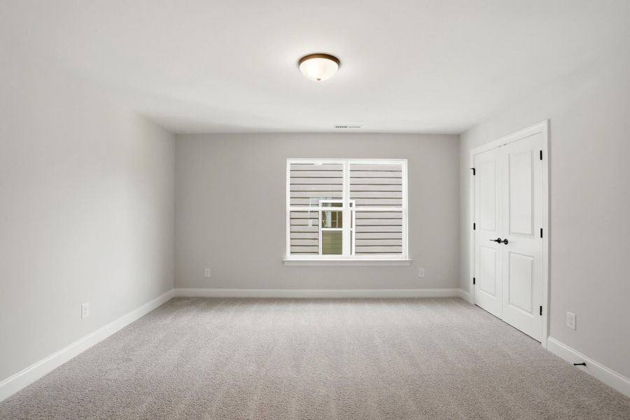 Spacious, unfurnished interior of a new home in Ashton Park, Monroe (Image 20).