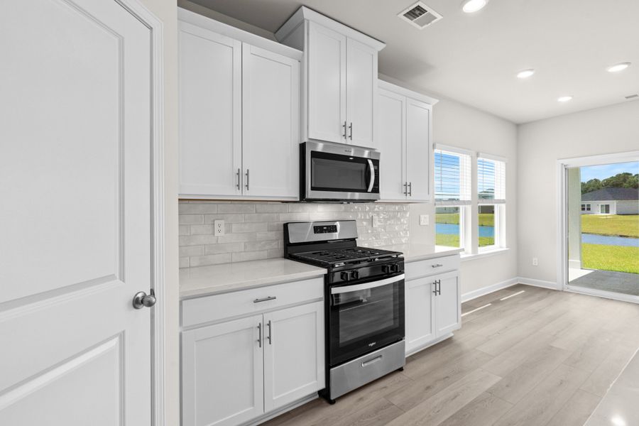 Furnished interior view inside a new home in Palmetto Place, Longs (Image 7). Furnished interior view inside a new home in Palmetto Place, Longs (Image 7).