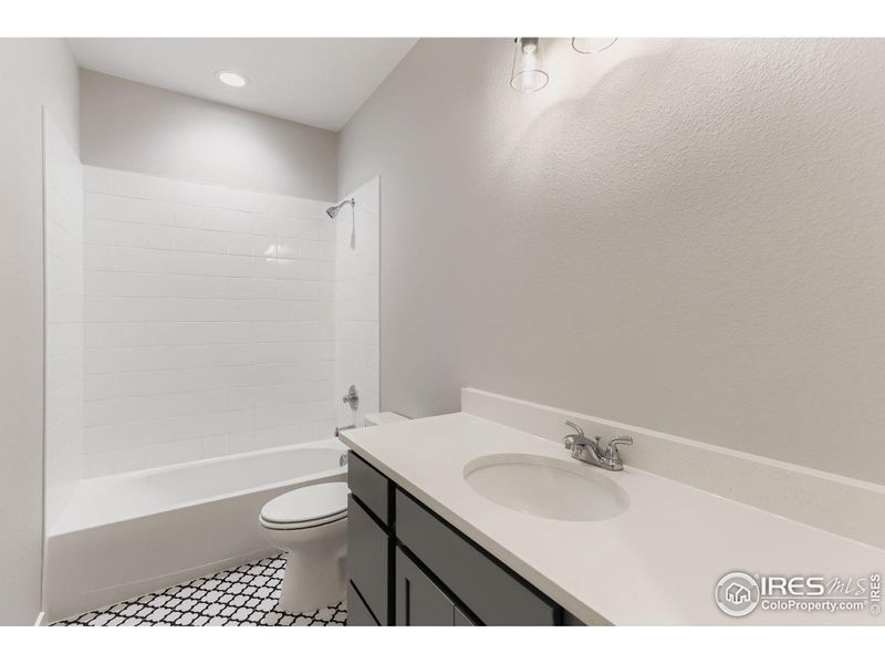 Furnished interior view inside a new home in Barefoot Lakes, Firestone (Image 8).