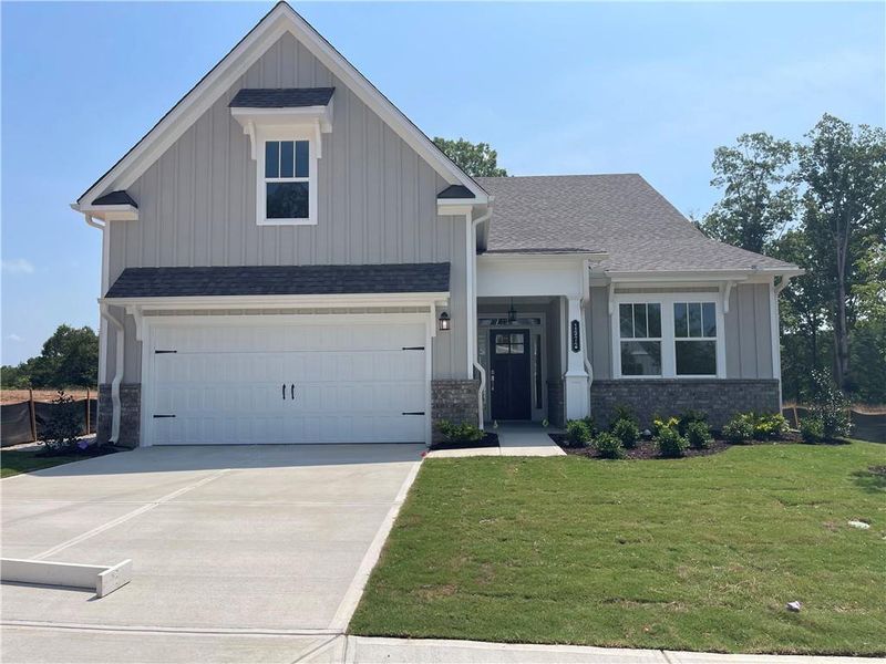 Front exterior of a new home in , Gainesville, GA, highlighting curb appeal (Image 28). Front exterior of a new home in , Gainesville, GA, highlighting curb appeal (Image 28).