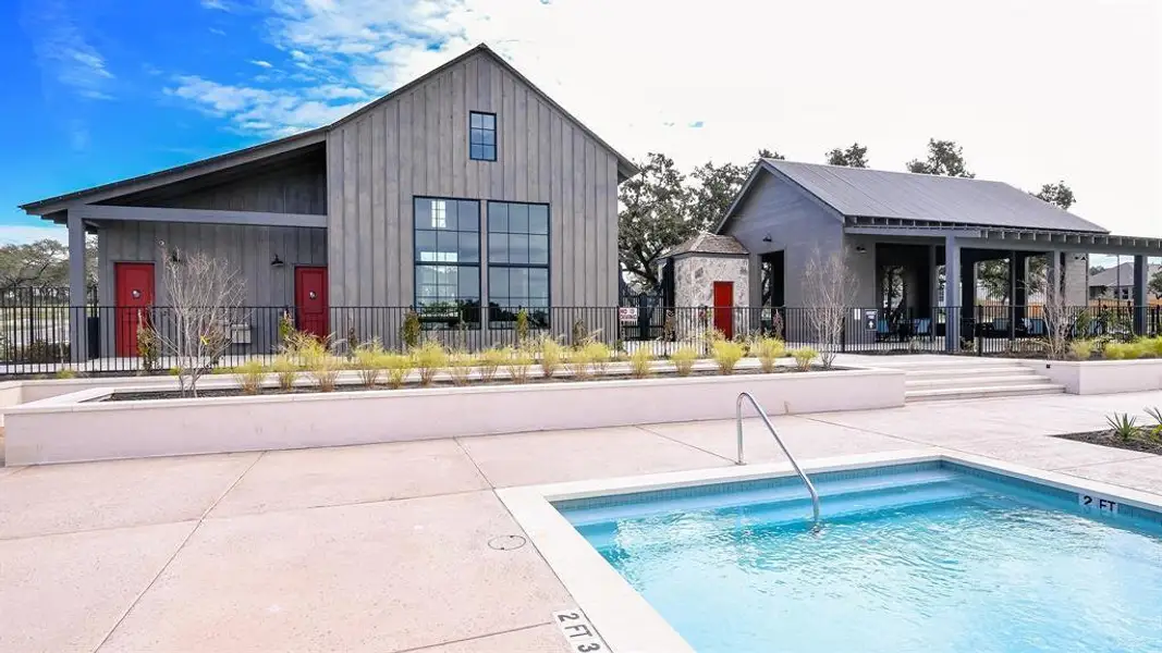 Front exterior of a new home in , Kyle, TX, highlighting curb appeal (Image 2).