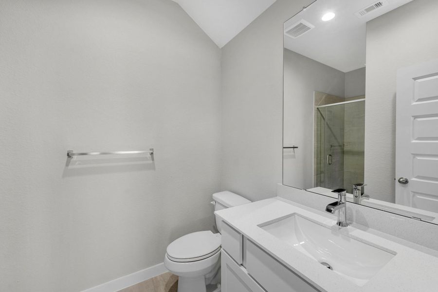 Furnished interior view inside a new home in Sunterra Lakes, Fulshear (Image 7).