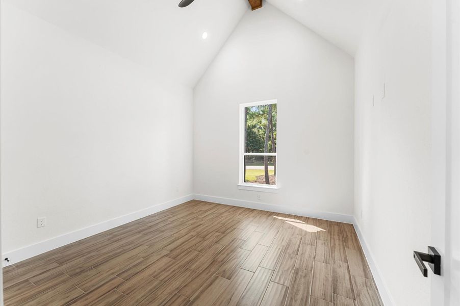 Generously sized bedrooms with large closets, natural light, and one with a cathedral ceiling for added charm. Generously sized bedrooms with large closets, natural light, and one with a cathedral ceiling for added charm.