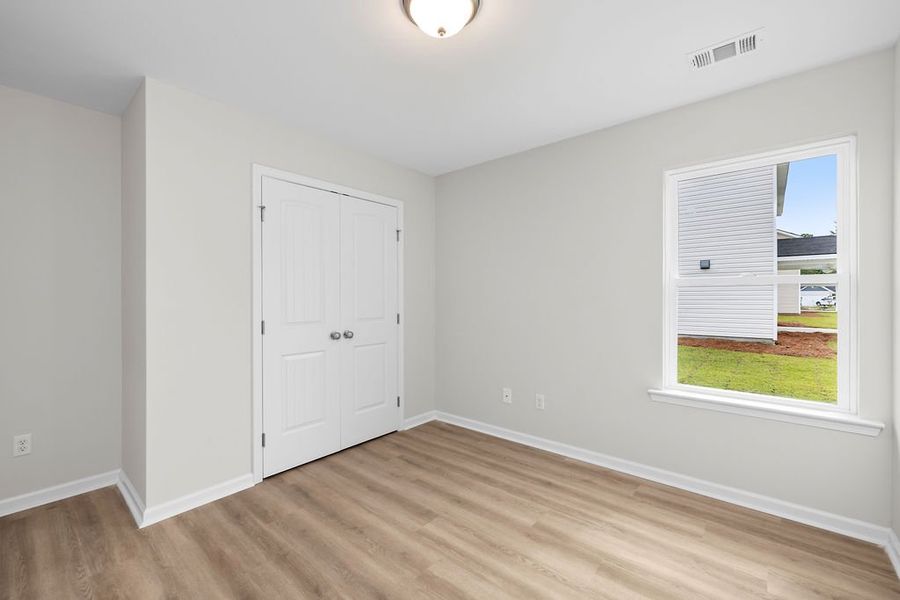 Representative unfurnished interior of a home built from the The Loblolly by Smith Family Homes in Heritage at New Riverside, Bluffton (Image 19).