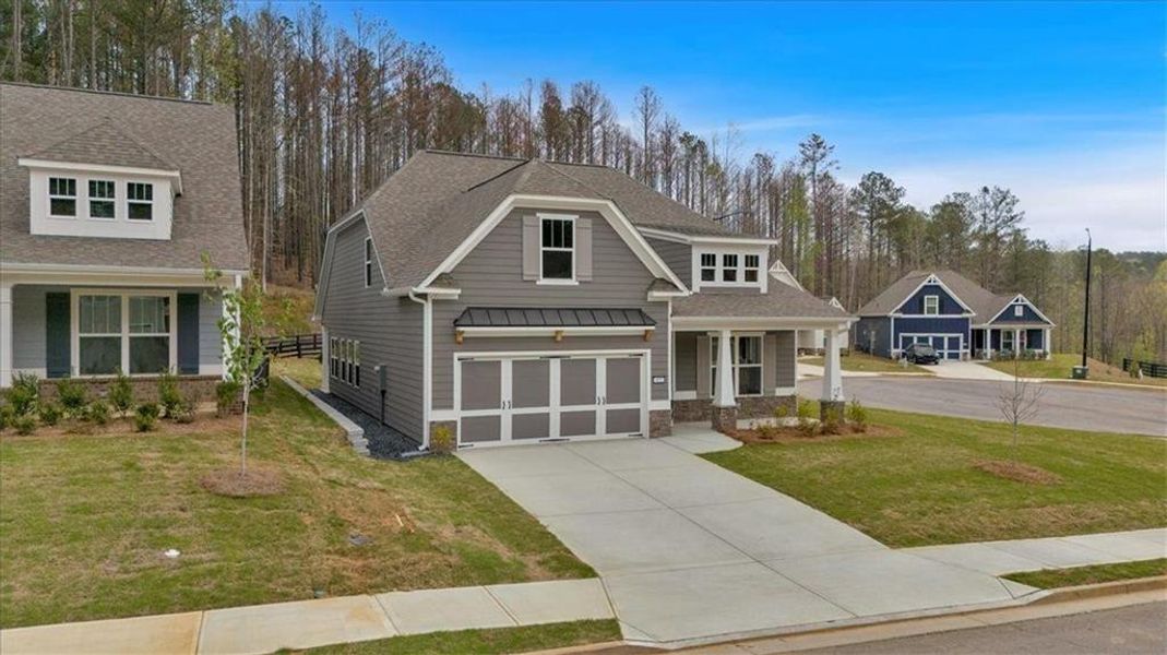 Front exterior of a new home in Stratford at NatureWalk, Dallas, GA, highlighting curb appeal (Image 2).