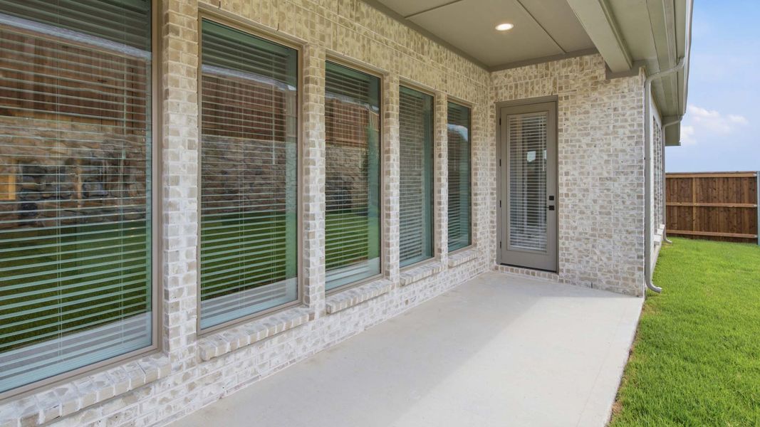 Exterior details and patio area of a home in Walsh, Fort Worth (Image 3). Exterior details and patio area of a home in Walsh, Fort Worth (Image 3).
