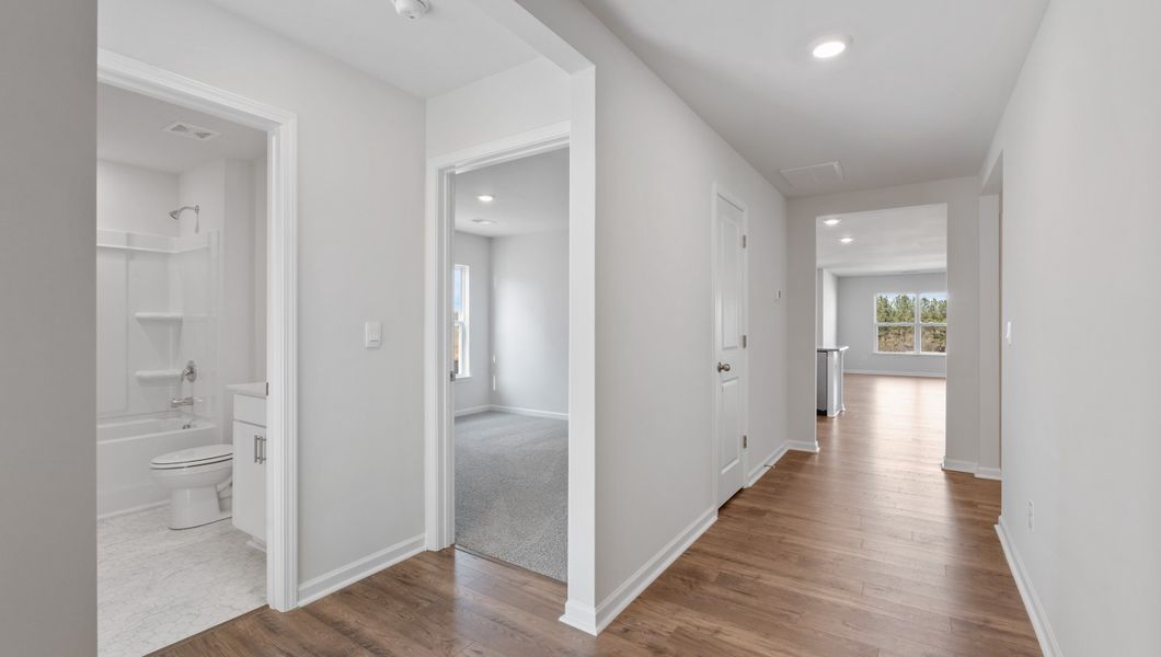 Representative unfurnished interior of a home built from the CALI by D.R. Horton in Waverly Station, Greenwood (Image 12).