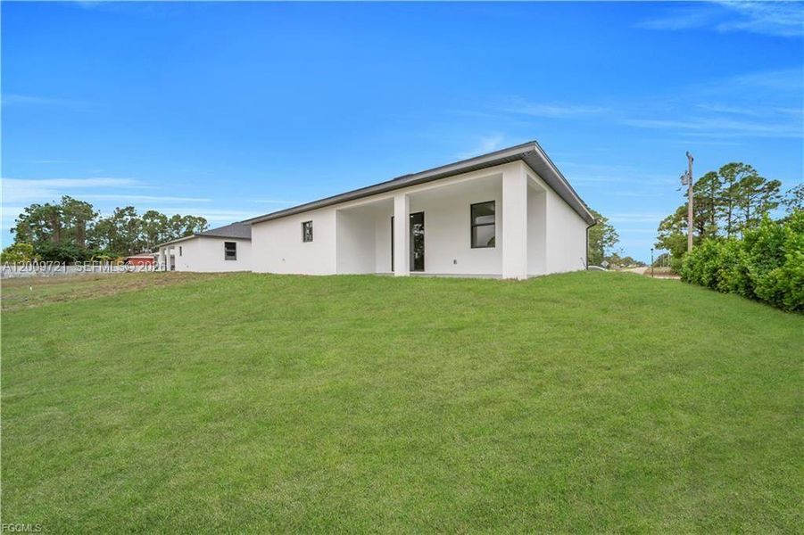 Exterior details and patio area of a home in , Lehigh Acres (Image 17).