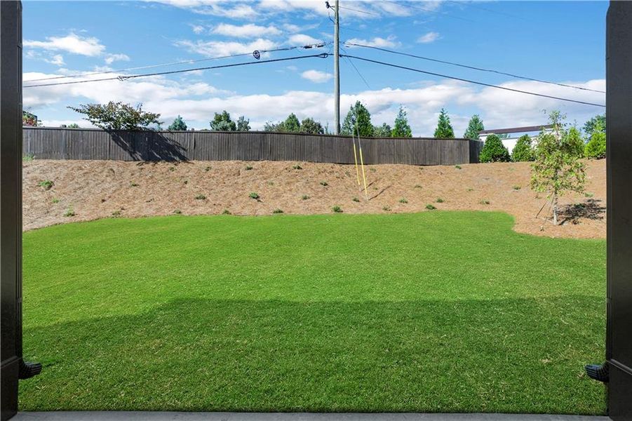 Exterior details and patio area of a home in The Paddocks at Doc Hughes, Buford (Image 4).