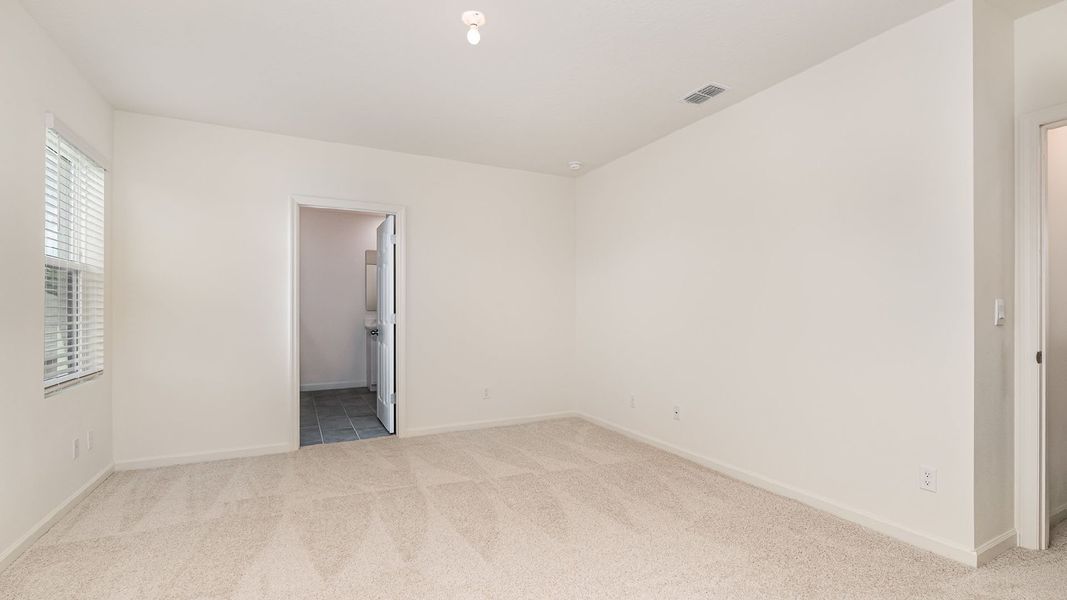Representative unfurnished interior of a home built from the Hayden by D.R. Horton in Morningside, Fort Pierce (Image 13).
