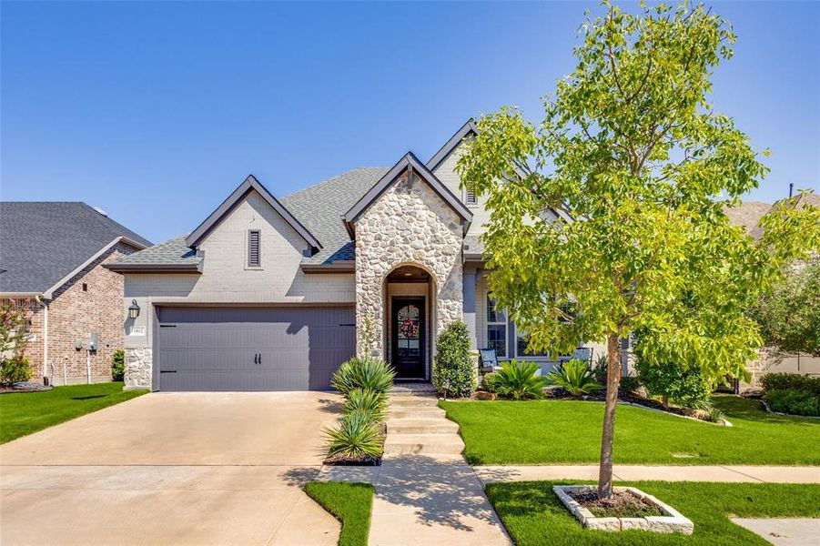 Front exterior of a new home in , Van Alstyne, TX, highlighting curb appeal (Image 23). Front exterior of a new home in , Van Alstyne, TX, highlighting curb appeal (Image 23).