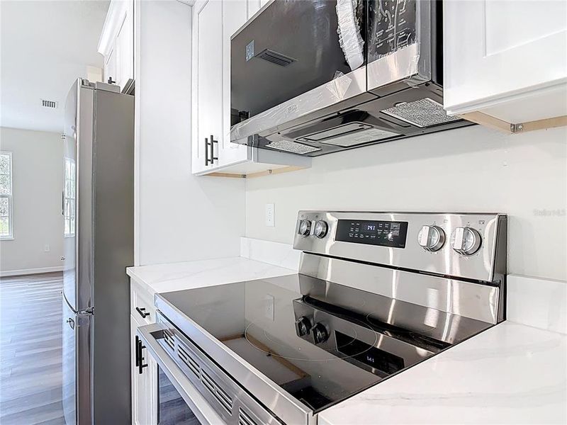 Furnished interior view inside a new home in , Deland (Image 10).