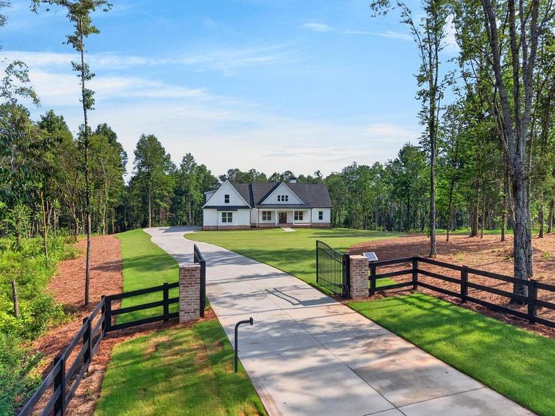 Front exterior of a new home in , Fairmount, GA, highlighting curb appeal (Image 31). Front exterior of a new home in , Fairmount, GA, highlighting curb appeal (Image 31).