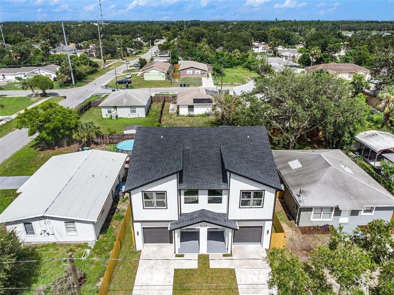 Front exterior of a new home in , Tampa, FL, highlighting curb appeal (Image 2).