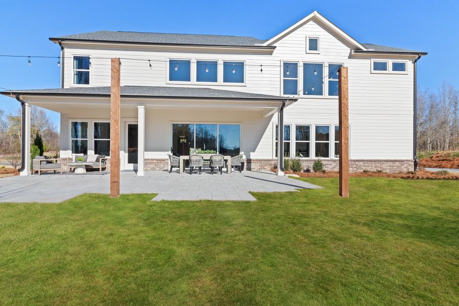Representative exterior details of a home built from the The Tolar by David Weekley Homes in Meadow Brook Farms, Cumming (Image 3).