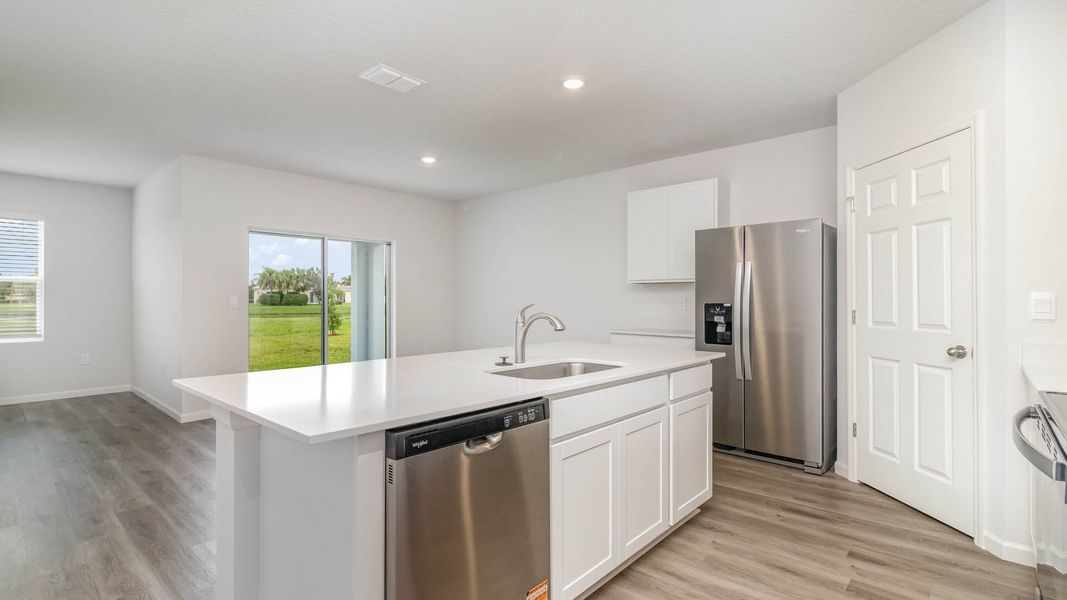Furnished interior view inside a new home in Cypress Bay West, Palm Bay (Image 7).