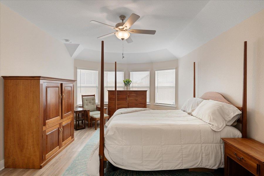 Primary Suite with bay windows.