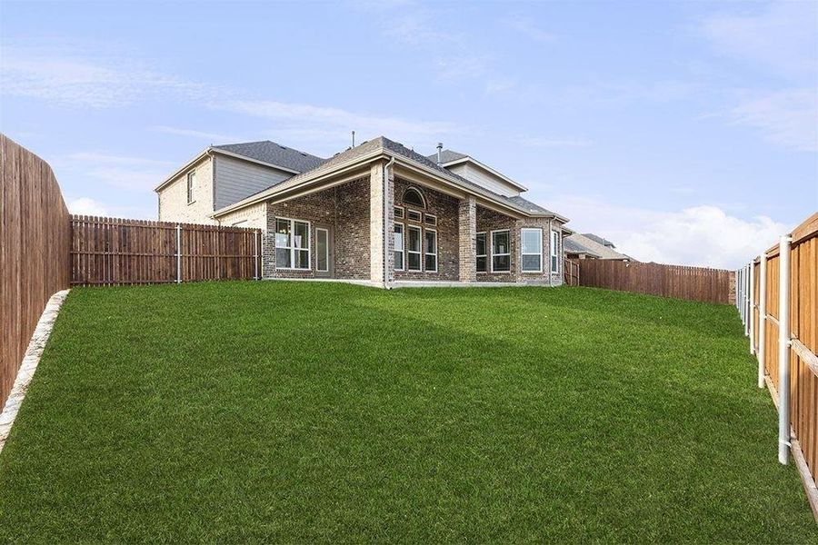 Exterior details and patio area of a home in Hawkins Meadows, Midlothian (Image 21).