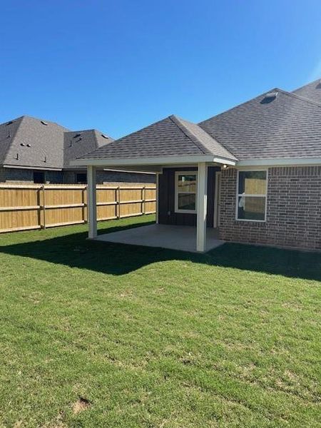 Exterior details and patio area of a home in , Springtown (Image 4).