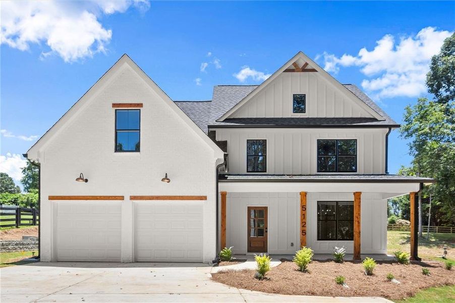 Front exterior of a new home in , Cumming, GA, highlighting curb appeal (Image 26). Front exterior of a new home in , Cumming, GA, highlighting curb appeal (Image 26).