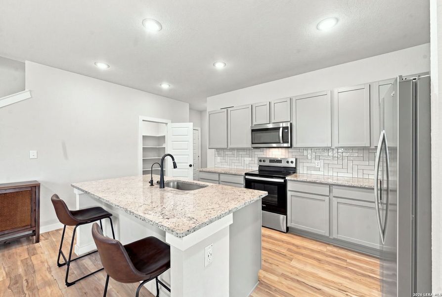 Furnished interior view inside a new home in Millican Grove, Converse (Image 31).