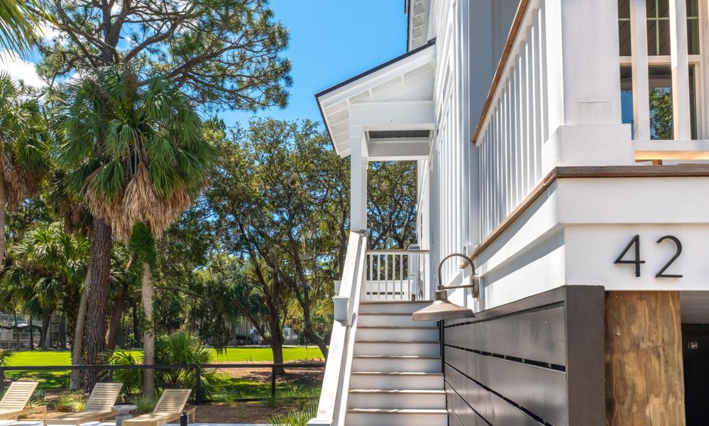 Front exterior of a new home in , Edisto Island, SC, highlighting curb appeal (Image 1). Front exterior of a new home in , Edisto Island, SC, highlighting curb appeal (Image 1).