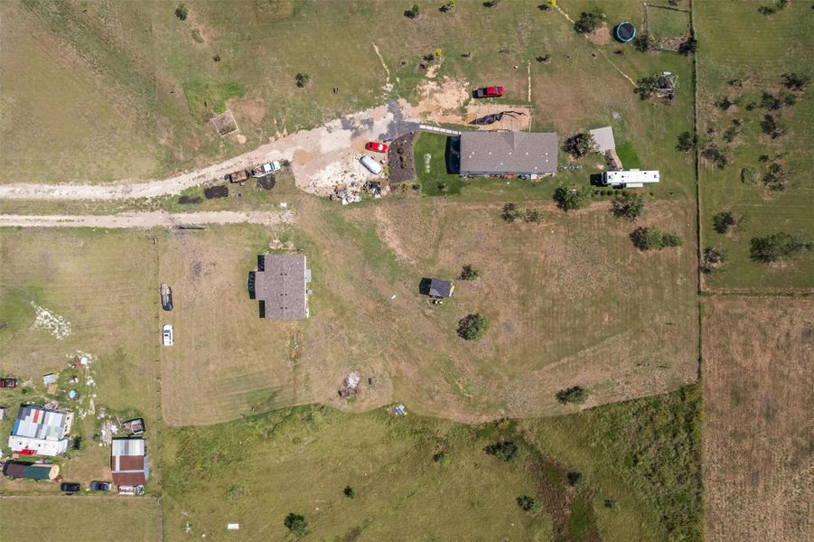 Aerial view of property and surrounding area with rural landscape