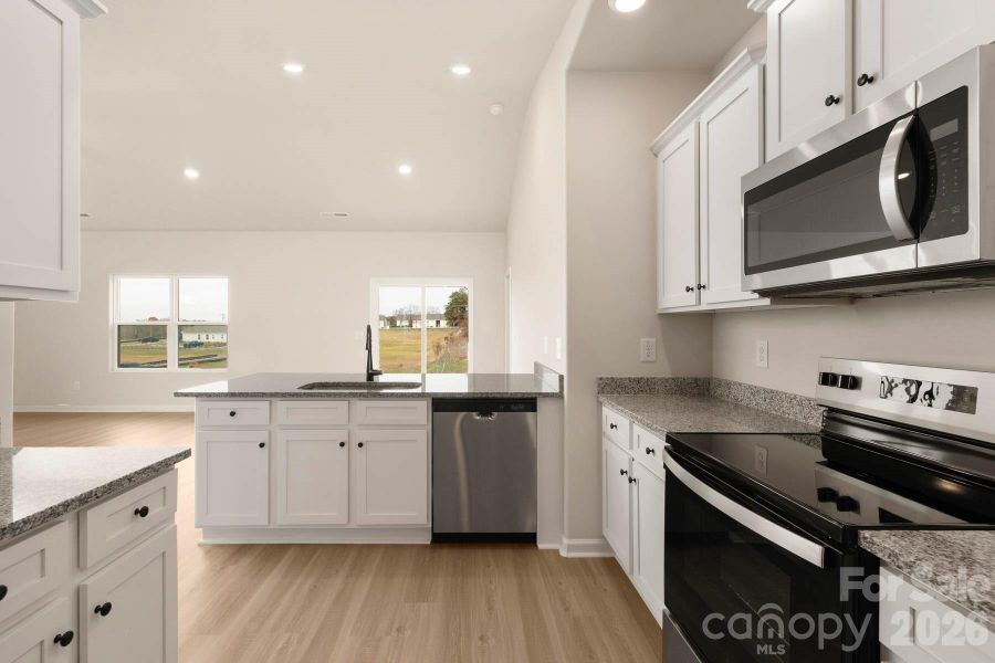Furnished interior view inside a new home in Stagecoach Station, Gastonia (Image 5).