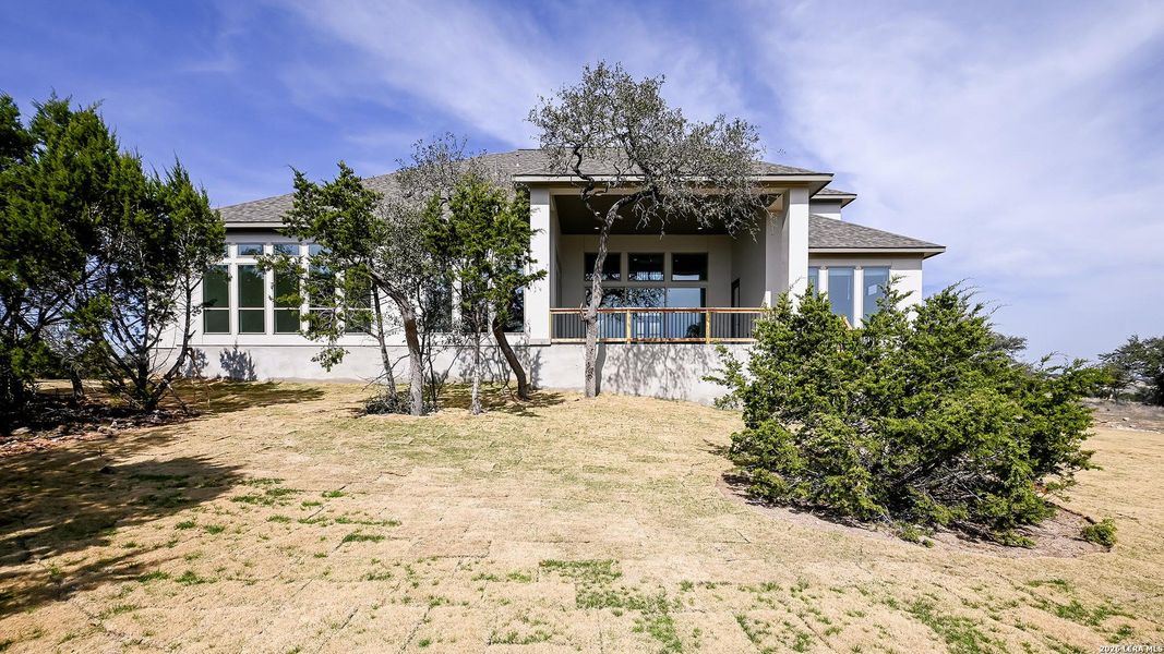 Exterior details and patio area of a home in Johnson Ranch, Bulverde (Image 3).