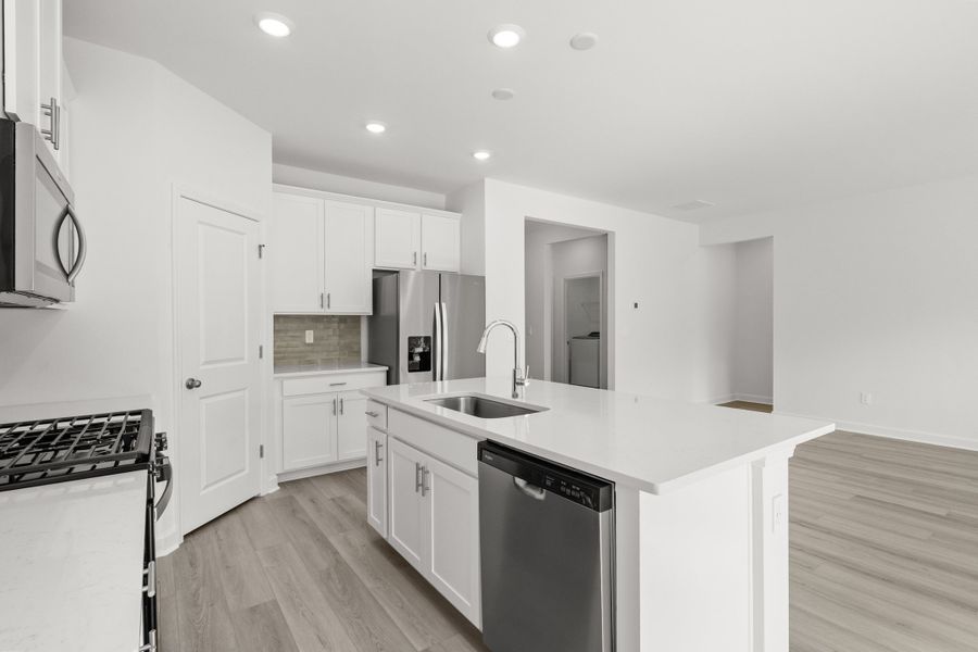 Furnished interior view inside a new home in Cypress Ridge - The Boardwalk Series, Longs (Image 9).