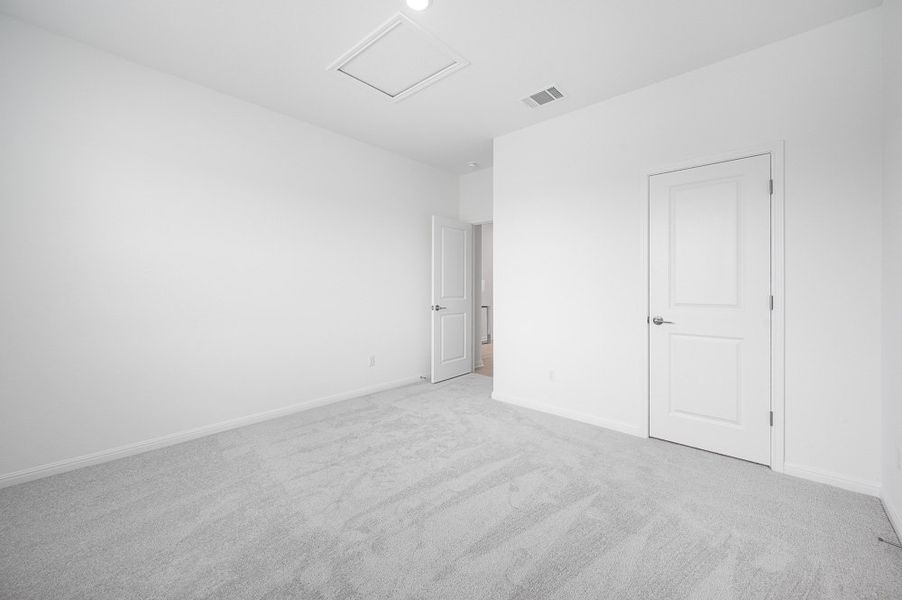 Representative unfurnished interior of a home built from the Sparrow by Taylor Morrison in Turner's Crossing 50s, Austin (Image 18).