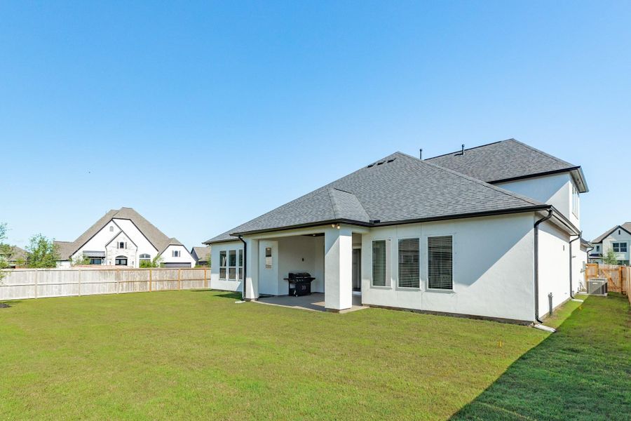 This home is situated on a spacious, oversized corner lot and features a fully fenced backyard, offering both privacy and ample outdoor space. Additionally, the property is fully equipped with professional-grade gutters, providing excellent drainage and protection for the home's exterior