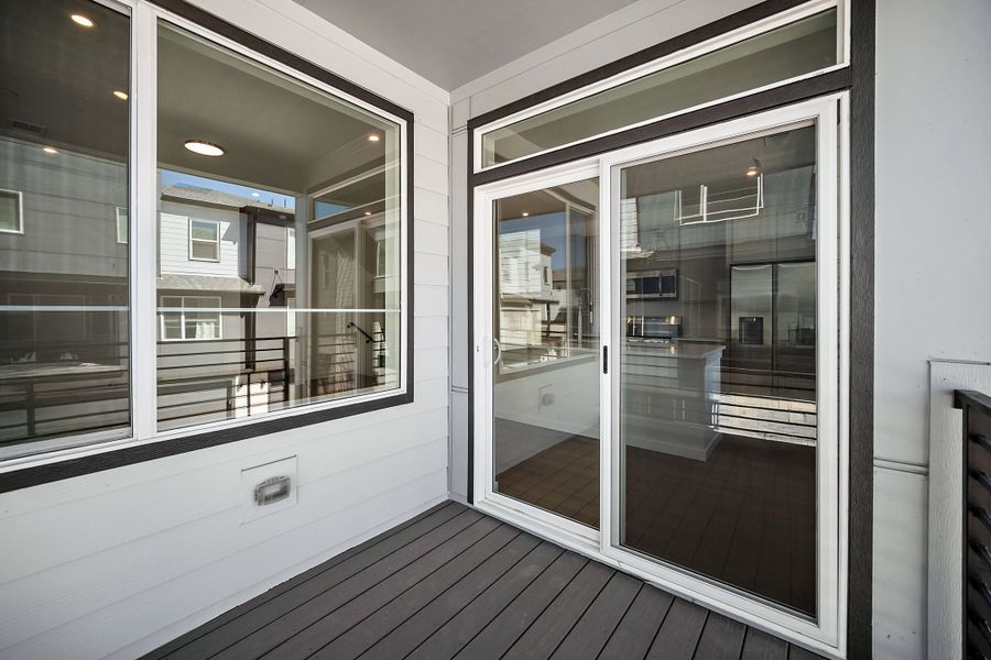 Exterior details and patio area of a home in Lyric at RidgeGate Townhomes, Lone Tree (Image 3). Exterior details and patio area of a home in Lyric at RidgeGate Townhomes, Lone Tree (Image 3).
