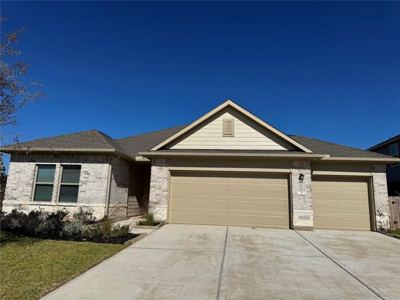 Front exterior of a new home in Arabella on the Prairie, Richmond, TX, highlighting curb appeal (Image 1).