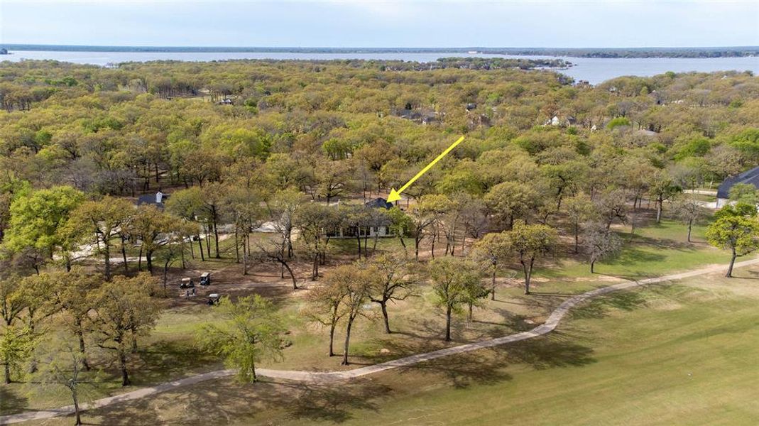 Birds eye view of property featuring a water view and a rural view