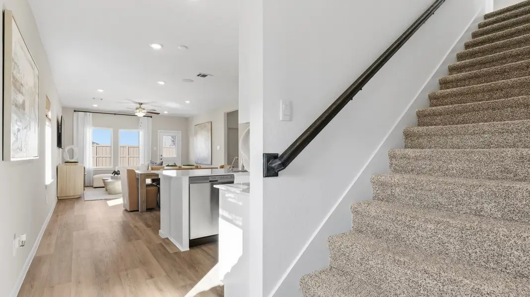 Furnished interior view inside a new home in Caldwell Crossing, Iowa Colony (Image 4). Furnished interior view inside a new home in Caldwell Crossing, Iowa Colony (Image 4).