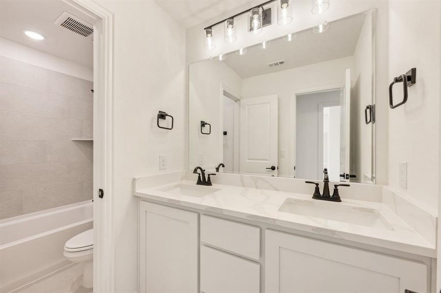 Furnished interior view inside a new home in Meadow Vista 60-65, Anna (Image 18). Furnished interior view inside a new home in Meadow Vista 60-65, Anna (Image 18).