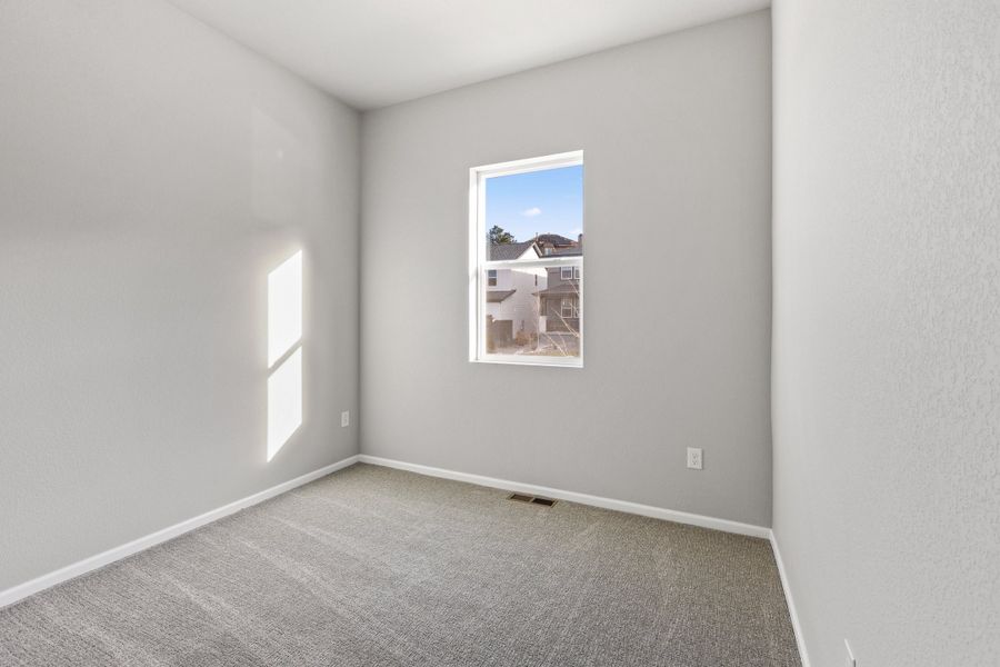 Spacious, unfurnished interior of a new home in The Manors Collection at Golden Overlook, Golden (Image 19).