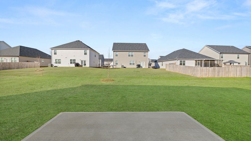 Exterior details and patio area of a home in The Preserve at Agricultural Village, Perry (Image 2).