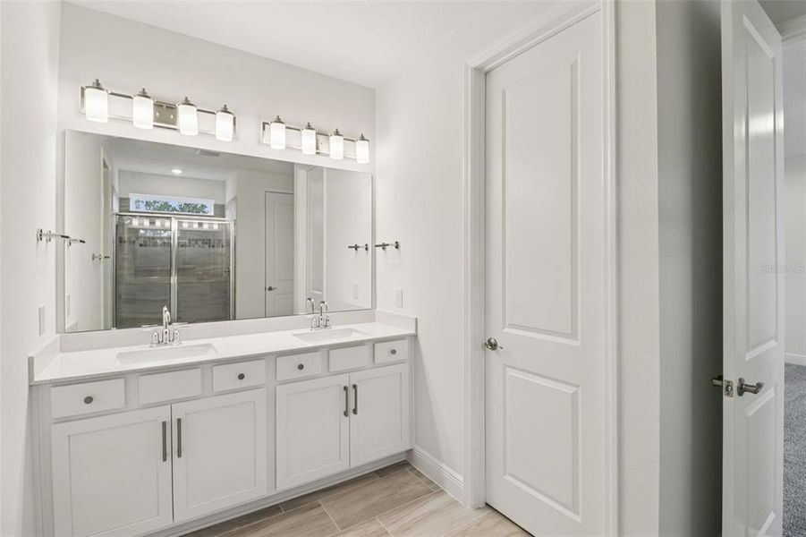 Furnished interior view inside a new home in Legends Preserve - Signature Series, Daytona Beach (Image 12).