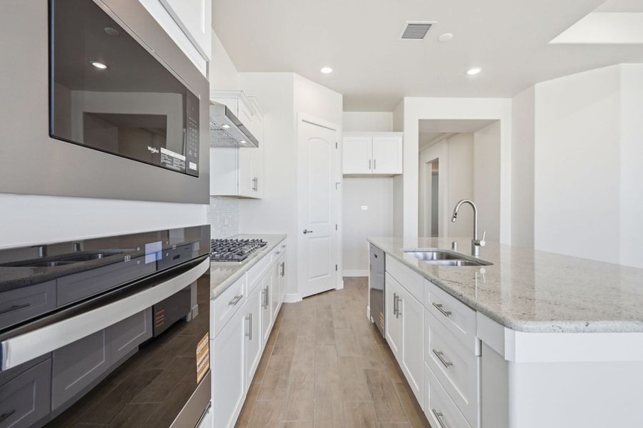 Furnished interior view inside a new home in Emerald Estates, El Paso (Image 6).