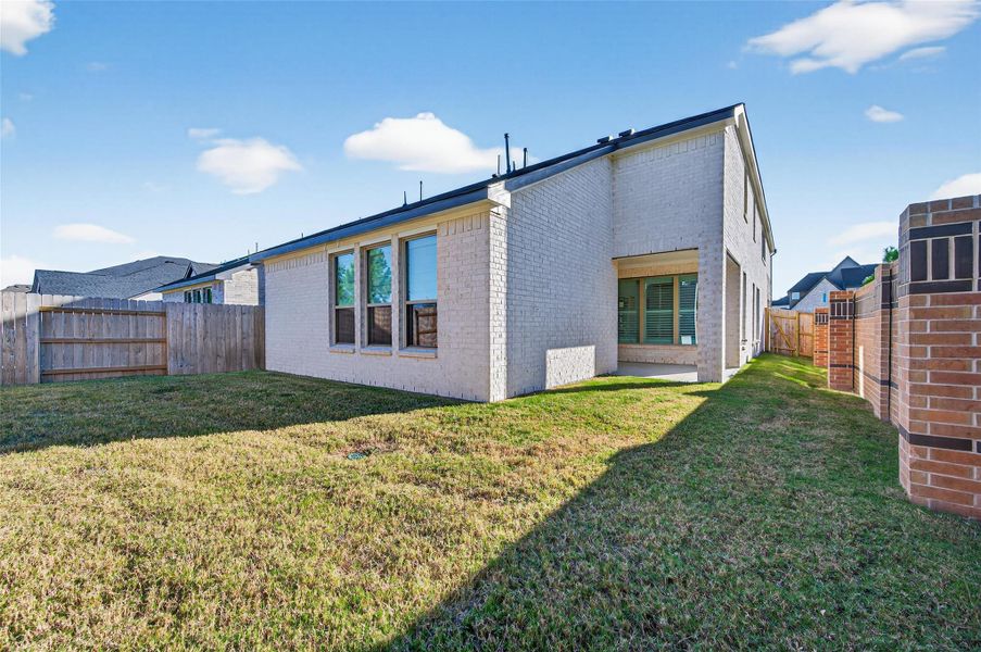 Exterior details and patio area of a home in Elyson - 40', Katy (Image 20). Exterior details and patio area of a home in Elyson - 40', Katy (Image 20).