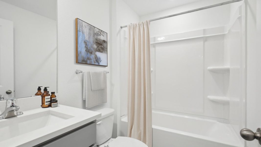 Representative furnished interior of a home built from the Archer by D.R. Horton in Brookside, Ruskin (Image 14).