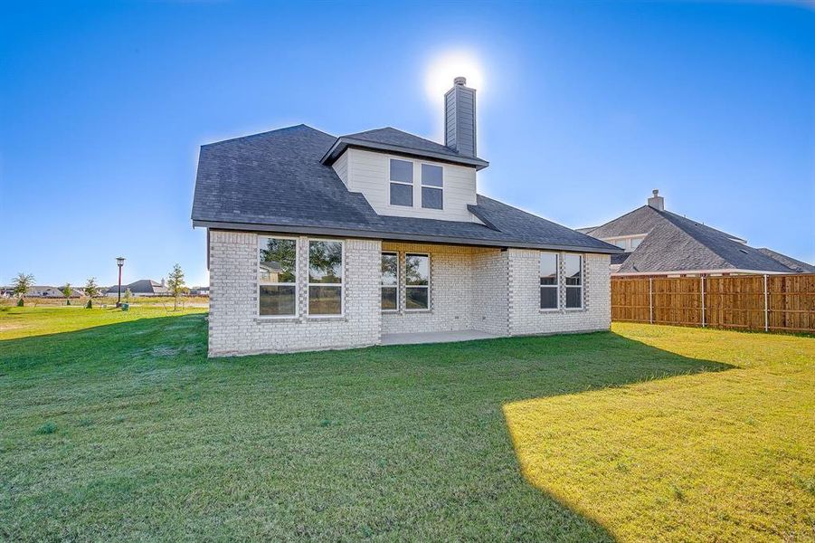 Spare room with light wood-style flooring and ceiling fan