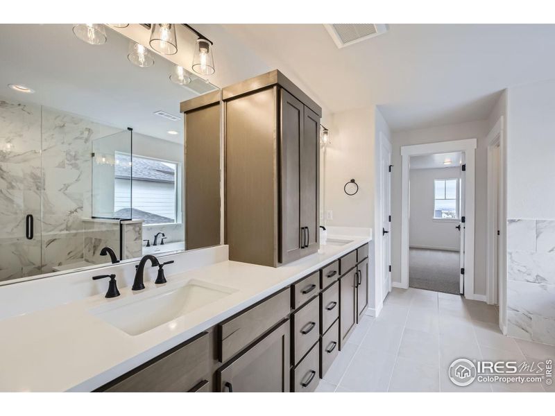 Furnished interior view inside a new home in RainDance National 60/70, Windsor (Image 6).