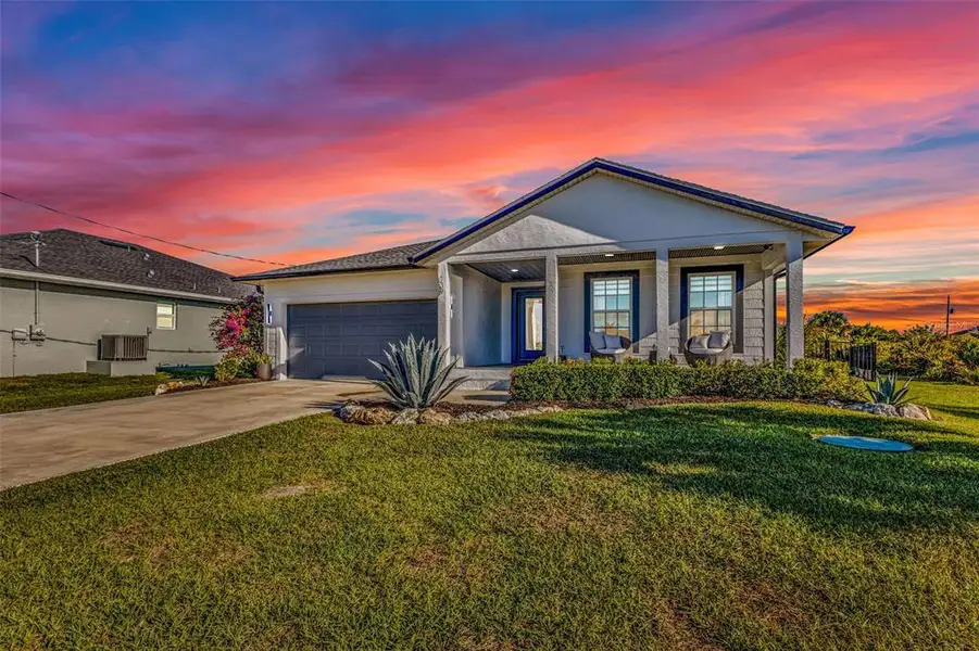 Front exterior of a new home in , Rotonda West, FL, highlighting curb appeal (Image 2). Front exterior of a new home in , Rotonda West, FL, highlighting curb appeal (Image 2).