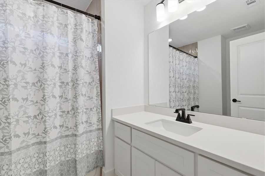 Furnished interior view inside a new home in Valencia on The Lake, Little Elm (Image 31).